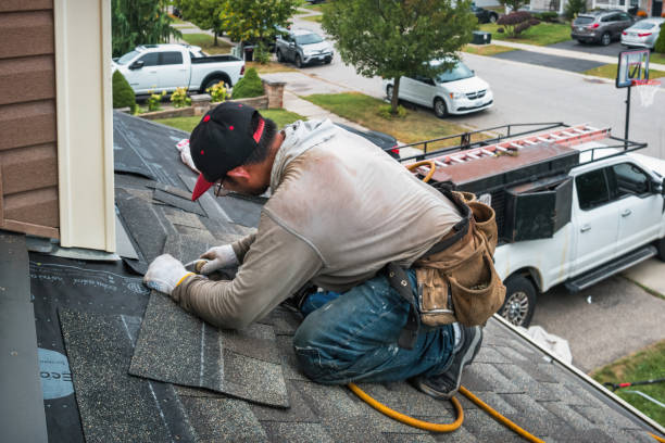 Professional Gutter Installation technician working in Durham, NC